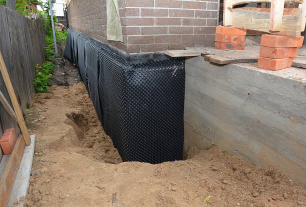SJ Waterproofing Pros technician performing targeted Vapor Barrier Installation assessment in Casco, WI